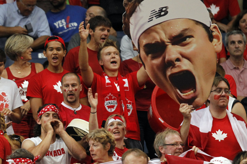 Crowd in Canadian colours at a tennis match